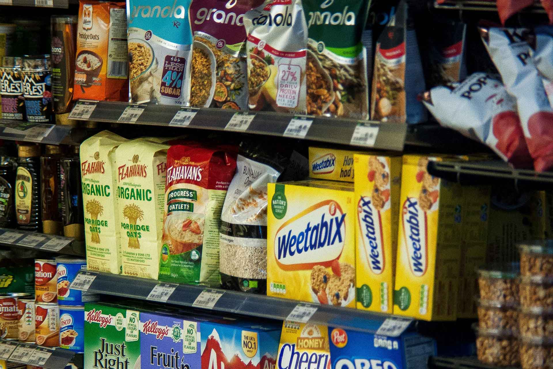 supermarket shelf with cereal on it